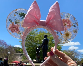 Resin Minnie Ears Pink Polka Dot with real flowers.  Sparkles in the sun.  MADE TO ORDER