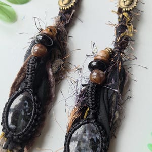 Onyx, Black Spectoralite Crystal Hair Wrap. Black & Brown Fairy Loc Extension, Sun Moon and Macrame Pendants. Gothic bohemian dread.
