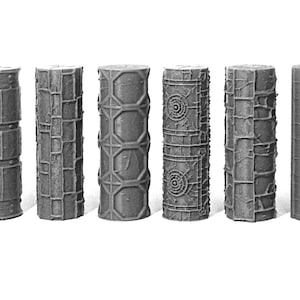 Puede incluir: Diez rodillos grises texturizados con diferentes patrones. Los rodillos tienen un diámetro de aproximadamente 7,5 cm y una longitud de 15 cm.