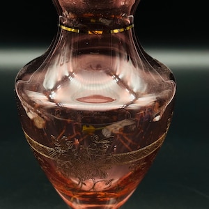 Vintage Cranberry Coloured Glass Footed Pedestal Vase with Hand Engraved Gold Floral Etchings and Painted Gold Banding to the Rim and Foot