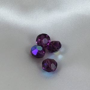 Vintage Swarovski 8mm &quot;aspirin&quot; beads. Amethyst AB finish. Article #5100, discontinued style. Per  bead.
