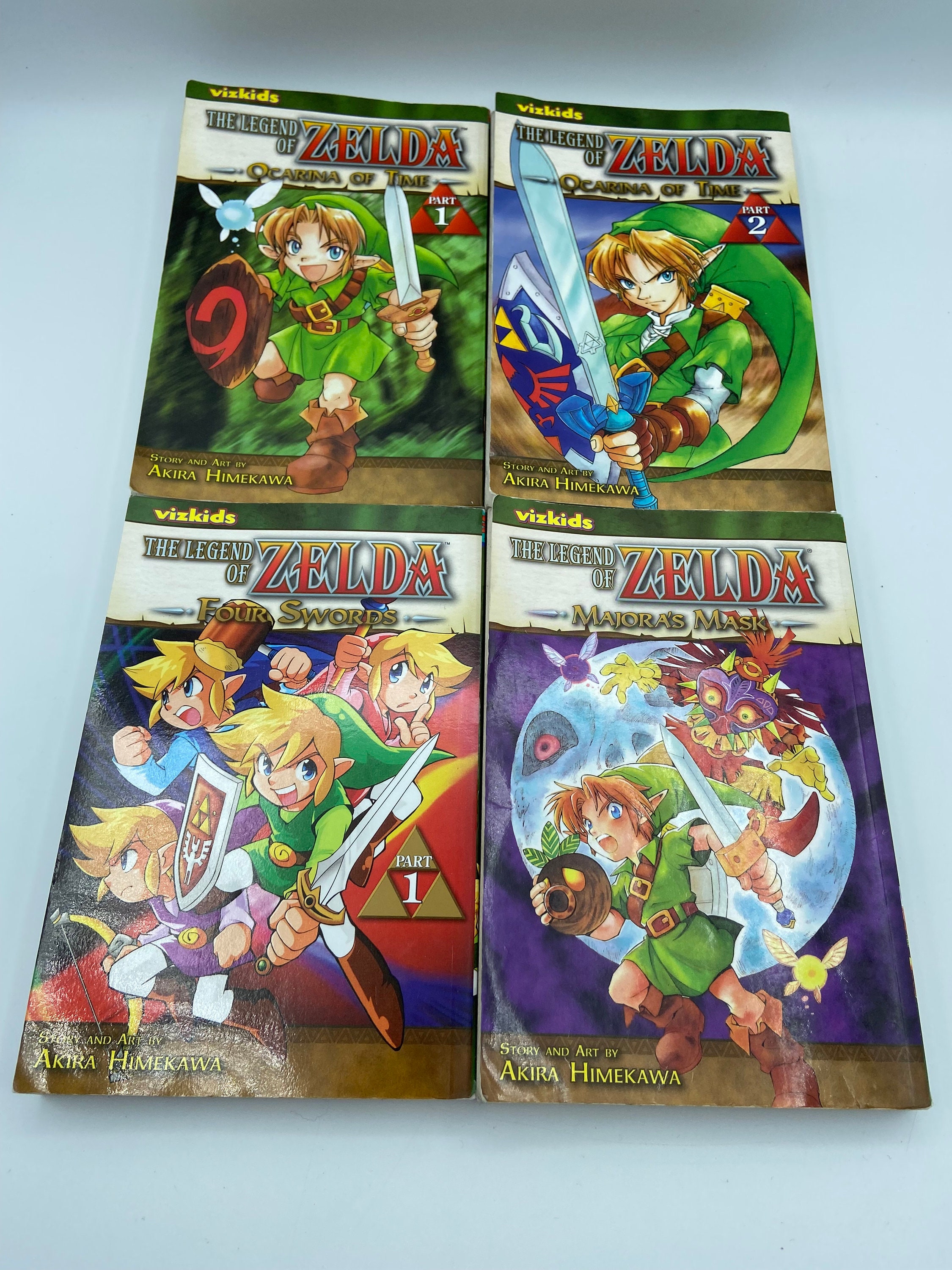 The Legend Of Zelda Ocarina Of Time Volume 1 & 2 English Manga Books  VizKids. Majora's Mask and Four Swords - Book 1