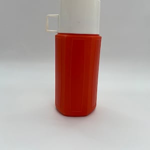 Termo vintage de marca Thermos.