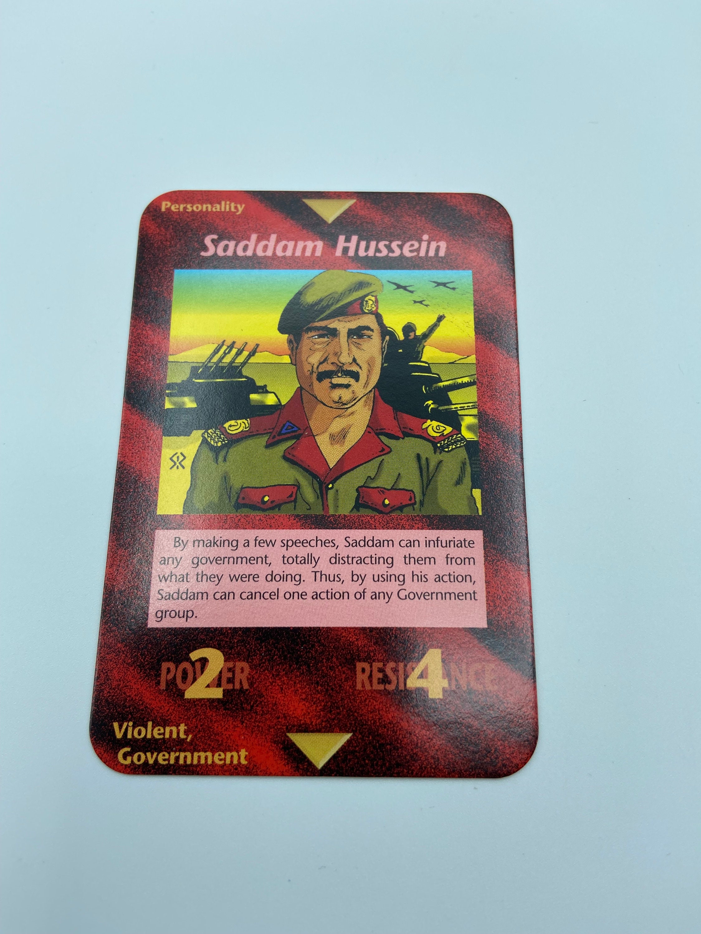 Illuminati New World Order Card: Saddam Hussein. Card is in Mint/ Unplayed  Shape. Comes From a Smoke Free Home. 