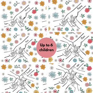 May include: Black and white line drawing of six hands holding each other, with the words "Mommy", "Nana", "Grandma", "Mum", "Dada", and "Name" written on the hands. The background is a white pattern of colorful flowers.