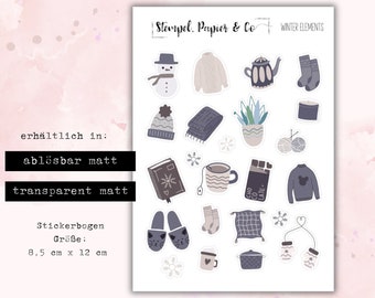 small sticker sheet with winter elements in beige/blue tones, individually removable stickers for bullet journal, planner and calendar