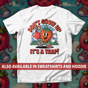 T-shirt Don't Grow Up It's a Trap, sweater Strawberry Holding Bomb, hoodie strip cartoon aardbei, T-shirt Sarcastic Explosive Humor