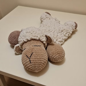 May include: A set of three ceramic mugs with a speckled, matte finish. The mugs are in shades of cream, light brown, and dark brown. Each mug has a simple, minimalist design, perfect for coffee or tea.