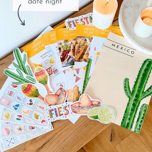 May include: A printable set of Mexico-themed party decorations, including a "Fiesta" banner, a sombrero, a cactus, a maraca, and a lime. The set also includes a printable bingo card with images of traditional Mexican items.