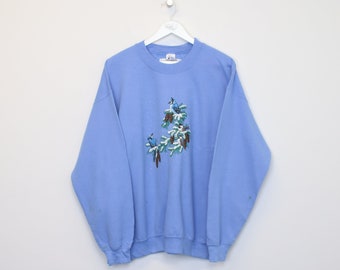 Vintage Gildan sweatshirt in blue. Best fits L