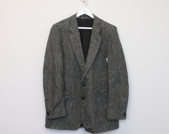 Vintage tweed jacket in grey. Best fits 301L