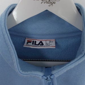 Vintage Fila Quarter Zip Sweatshirt in Blue, White, and Black