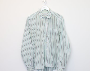 Vintage Lacoste striped shirt in green and white. Best fits XL