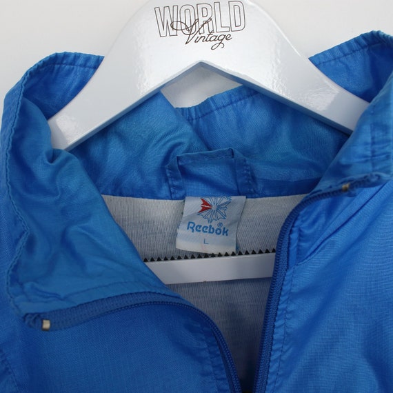 Vintage Reebok track jacket in blue, black and gr… - image 4