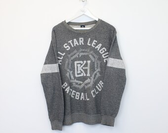 Vintage Clockhouse-Sweatshirt in Grau. Passt am besten zu XL