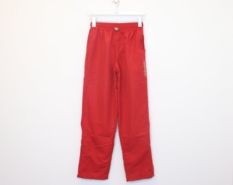 Vintage womens Deadstock Reebok joggers in red. Best fits M