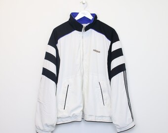 Vintage Adidas jacket in black and white. Best fits L