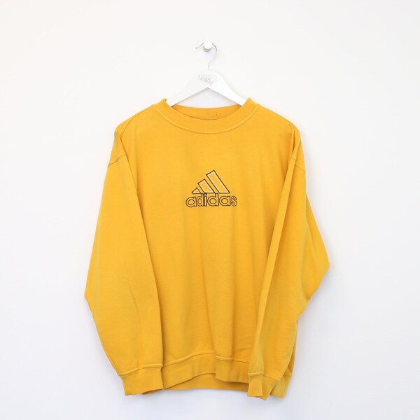 Vintage Adidas sweatshirt in yellow. Best fits L