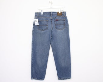 Vintage Women's Ralph Lauren jeans in blue. Best fits W33 L25