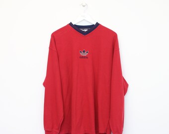 Vintage Adidas sweatshirt in red. Best fits XL