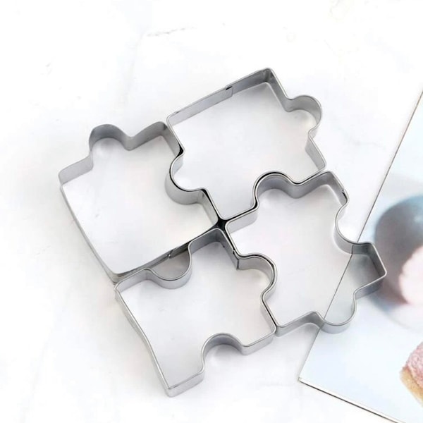 4 Piece Silver Stainless Steel Cookie Cutters in Jigsaw Puzzle Piece Shapes