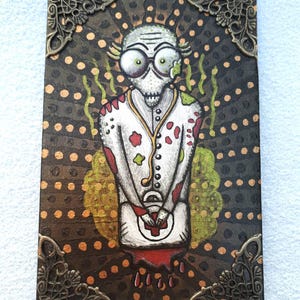 May include: A rectangular artwork featuring a zombie doctor with large glasses, wearing a white coat with red and green accents. The background is dark with gold polka dots and ornate bronze corners. The zombie holds a medical bag with a red cross.