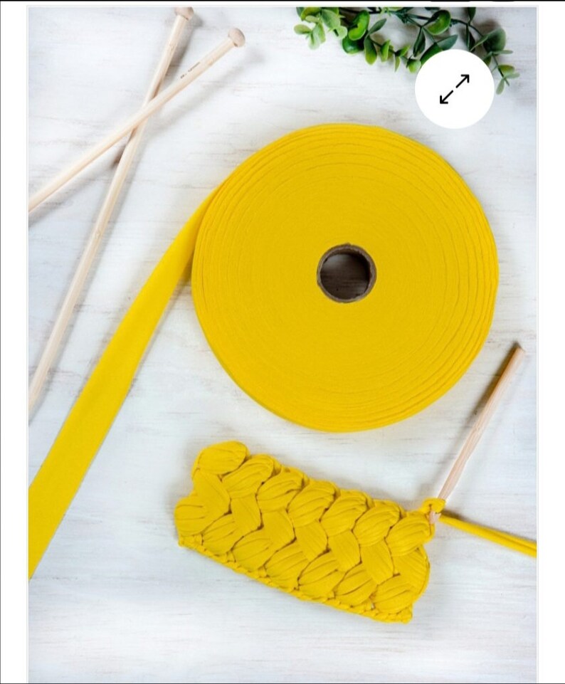 May include: A yellow cotton cord, a roll of yellow cotton cord, and a yellow crocheted piece. The cord is used for crocheting.