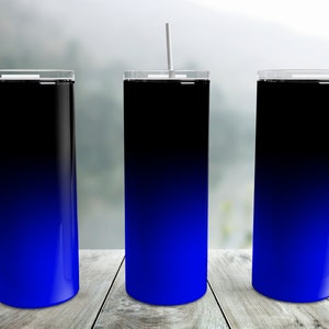 May include: Three stainless steel tumblers with black lids and blue ombre designs. The tumblers have white straws inserted in the lids.
