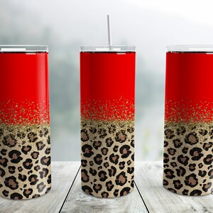 May include: Three red stainless steel tumblers with gold glitter and a leopard print design.