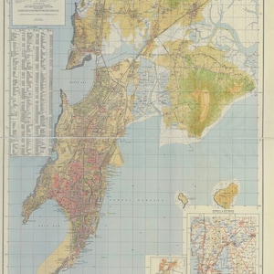 May include: A vintage map of Bombay, India, showing the city's layout and surrounding areas. The map is divided into sections, with a key and legend in the upper left corner. The map is printed on a light blue background with brown and green lines and text.