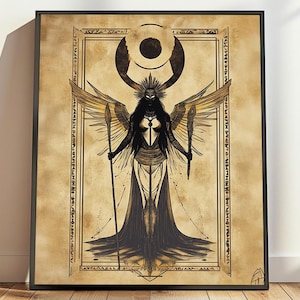 May include: Framed art print featuring a stylized illustration of a dark-skinned figure with wings, holding a spear. The artwork is in shades of black, gold, and beige, with a detailed border and celestial elements. The print is displayed in a black frame.