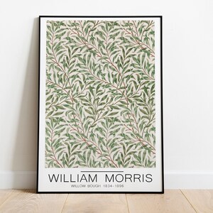 Puede incluir: Un póster enmarcado en negro con un patrón floral verde y blanco. El póster presenta el texto "William Morris" y "Willow Bough 1834-1896".