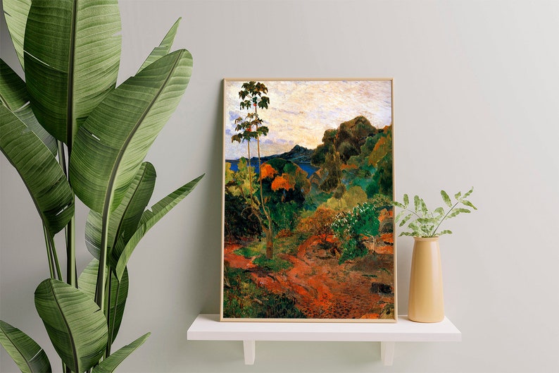 May include: A framed painting depicting a lush tropical landscape with a tall tree in the foreground and a mountain range in the background. The painting is done in a vibrant palette of greens, browns, and oranges.