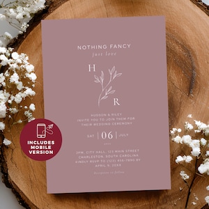 Peut inclure: Une invitation de mariage mauve avec le texte "NOTHING FANCY just love." Elle comprend les initiales "H" et "R" avec un motif floral. L'invitation comprend également la date, l'heure et le lieu du mariage. Un petit autocollant rond indique "INCLUDES MOBILE VERSION."