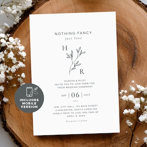 May include: A white wedding invitation with the text "NOTHING FANCY just love". The invitation includes the names Hudson & Riley, the date, time, and location of the ceremony. A small icon indicates a mobile version is included.
