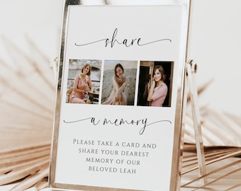 Puede incluir: Un cartel blanco con texto negro que dice "compartir un recuerdo" con tres fotos de una mujer con un vestido rosa. El texto debajo de las fotos dice "Por favor, tome una tarjeta y comparta su recuerdo más querido de nuestra querida Leah." El cartel está en un caballete plateado. Plantilla de tarjeta de memoria incluida.