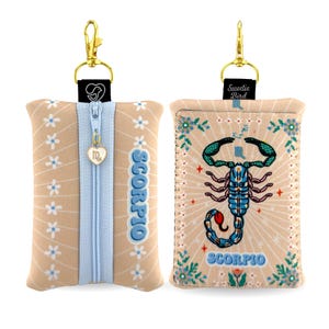 May include: A set of three ceramic mugs with a speckled, matte finish. The mugs are in shades of cream, light gray, and dark gray. Each mug has a simple, minimalist design, perfect for coffee or tea.