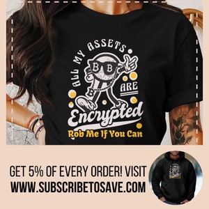 May include: Black t-shirt with a cartoon character wearing sunglasses and a chain with a Bitcoin symbol. The text on the shirt reads "All my assets are encrypted. Rob me if you can."