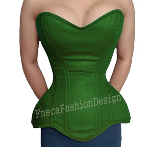 May include: A green strapless corset with a sweetheart neckline and a pointed bottom. The corset has boning and seams for structure. The text "FnecaFashionDesign" is printed on the front of the corset.