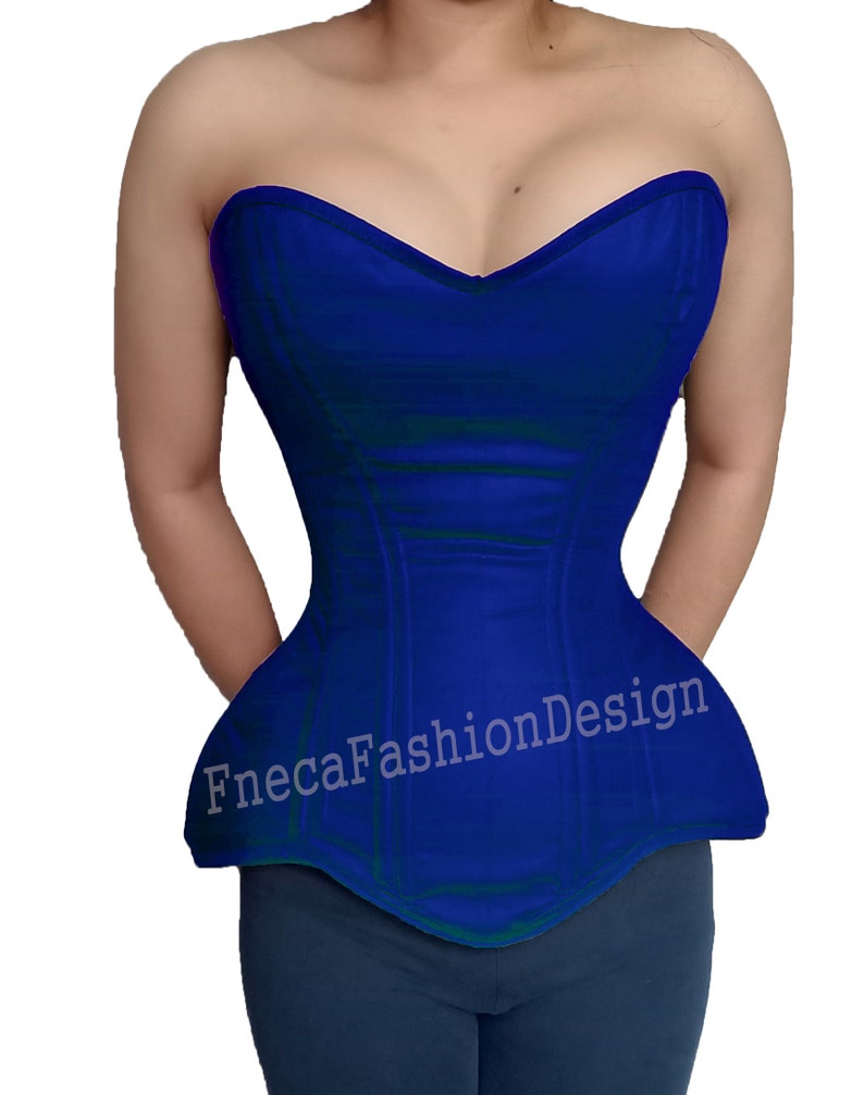 May include: A strapless blue satin corset with boning and a sweetheart neckline. The corset has a long, pointed waist and a flared skirt. The text "FnecaFashionDesign" is printed on the front of the corset.