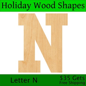 May include: A wooden letter N, painted in a light wood color. The letter is in a blocky, bold font style. The letter is isolated on a white background. The text "Letter N" is at the bottom of the image.