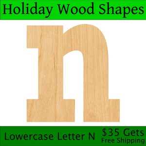 May include: Lowercase letter N cut out of unfinished wood. The letter is approximately 6 inches tall.  Holiday Wood Shapes.
