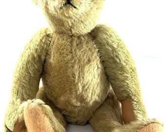 Antique,fully jointed,teddy bear,worn,threadbare,mohair