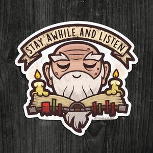 May include: A sticker with a cartoon illustration of an elderly man with a long white beard, closed eyes, and a calm expression. The sticker has the text "STAY AWHILE AND LISTEN" on a banner above the man's head. Two lit candles flank an open book.