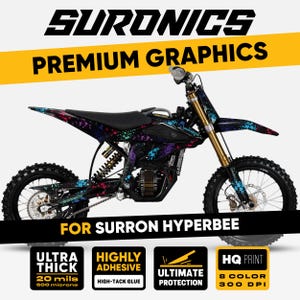May include: A Surron Hyperbee electric dirt bike with premium graphics. The bike features a black frame with colorful splatter designs in blue, purple, and green. The image includes text that says "Ultra Thick", "Highly Adhesive", "Ultimate Protection", and "HQ Print".