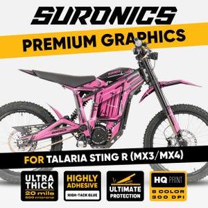 May include: Pink and black SurRon electric motorcycle with graphic design. The image features the text "SURONICS PREMIUM GRAPHICS" and "FOR TALARIA STING R (MX3/MX4)". The graphic is ultra thick, highly adhesive, and offers ultimate protection with an HQ print.