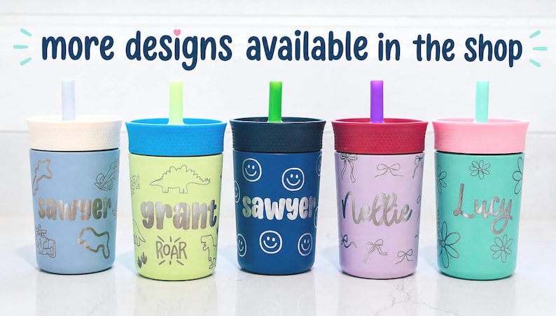 May include: Five colorful plastic tumblers with lids and straws, each featuring a unique design and a personalized name in silver lettering. The text 'more designs available in the shop' is displayed at the top of the image above the cups.
