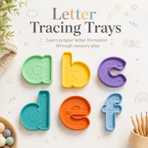 May include: Six colourful letter tracing trays shaped like the lowercase letters a, b, c, d, e, and f. Each tray features engraved directional arrows and dotted lines to guide writing. The text "Letter Tracing Trays" is displayed at the top.