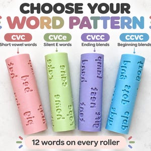 May include: Four cylindrical rollers in pink, light green, purple, and blue, each embossed with words. Text above reads CHOOSE YOUR WORD PATTERN with categories CVC, CVCe, CVCC, CCVC. Text below reads 12 words on every roller.