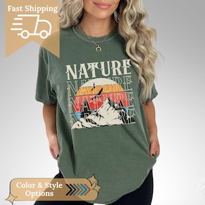 Mountain Graphic Tee Vintage Style Design Nature Inspired Print Adventure Lifestyle Collection Casual Outdoor Wear Premium Cotton Blend Comfortable Daily Fashion Wilderness Theme Art Retro Pattern Details Gift Idea Perfect Adventure Style